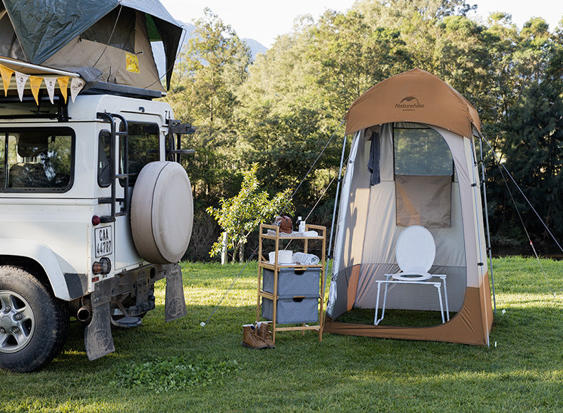 Cabane à langer pliante avec protection solaire pour une personne